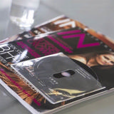 Self-adhesive CD Pocket with Finger Hole